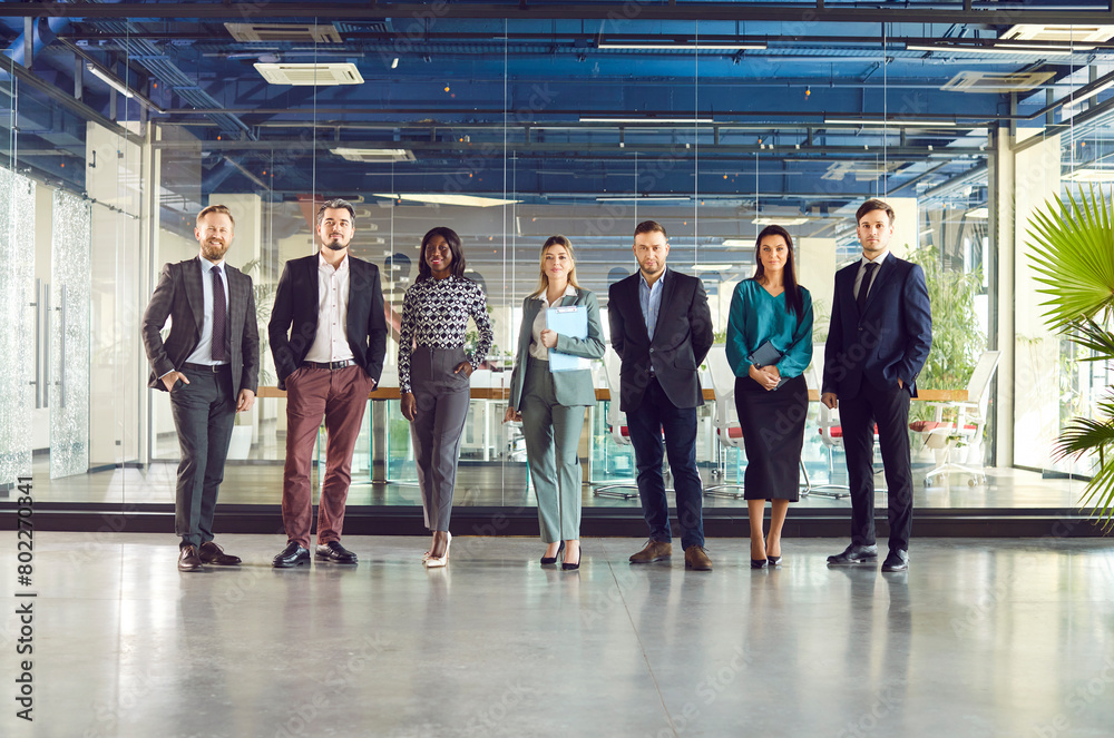 Business leaders with employees group full length portrait looking at camera, happy professional multicultural diverse office team people, corporate service, proud or good career, human resource unity