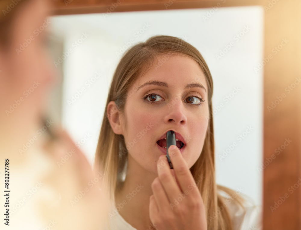 Woman, home and mirror with lipstick for beauty, reflection and confident with results. Female person, face and lips for appearance, aesthetics and cosmetics for transformation with self care Woman, home and mirror with lipstick for beauty, reflection and confident with results. Female person, face and lips for appearance, aesthetics and cosmetics for transformation with self care