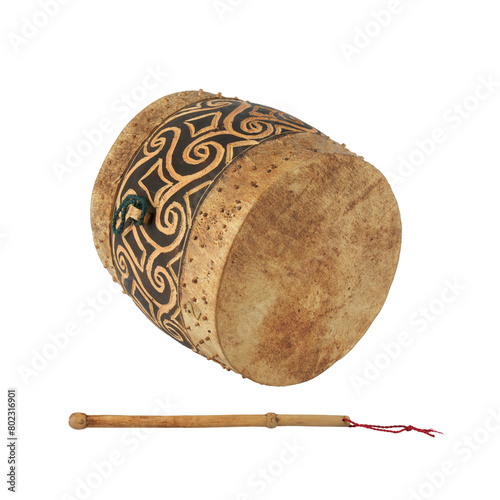 Kendang or gendang is a traditional Indonesian musical instrument made from a tree trunk which has been hollowed out and covered with cow or goat skin photo