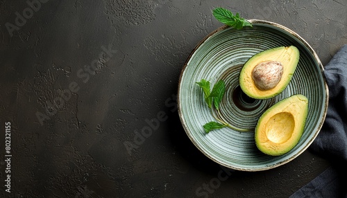 Avocado, healthy wellness breakfast on dark background with copy space top view. Food menu or restaurant banner concept