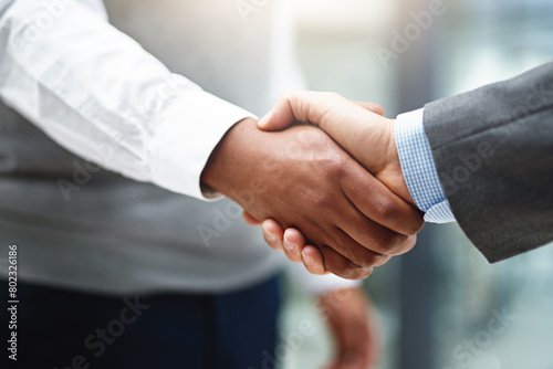 Man, partner and handshake for agreement in office for success for promotion with collaboration by trust or unity. People, deal and greeting for welcome or introduction with care or support