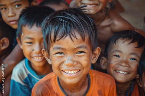 Portrait of a group of happy asian children smiling at camera