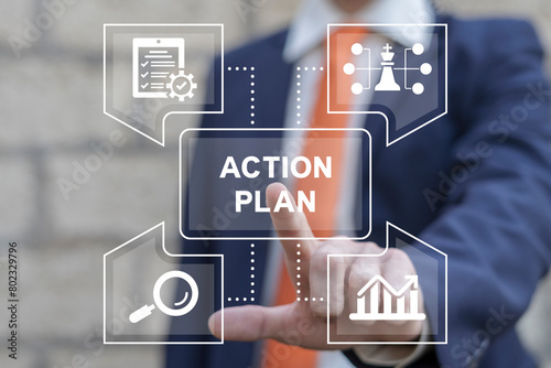 Obraz na płótnie Business man using virtual touch screen presses text: ACTION PLAN. Concept of business action plan, planning, schedule, strategy, analysis, tasks, goal, collaboration and objective. Time management. w salonie