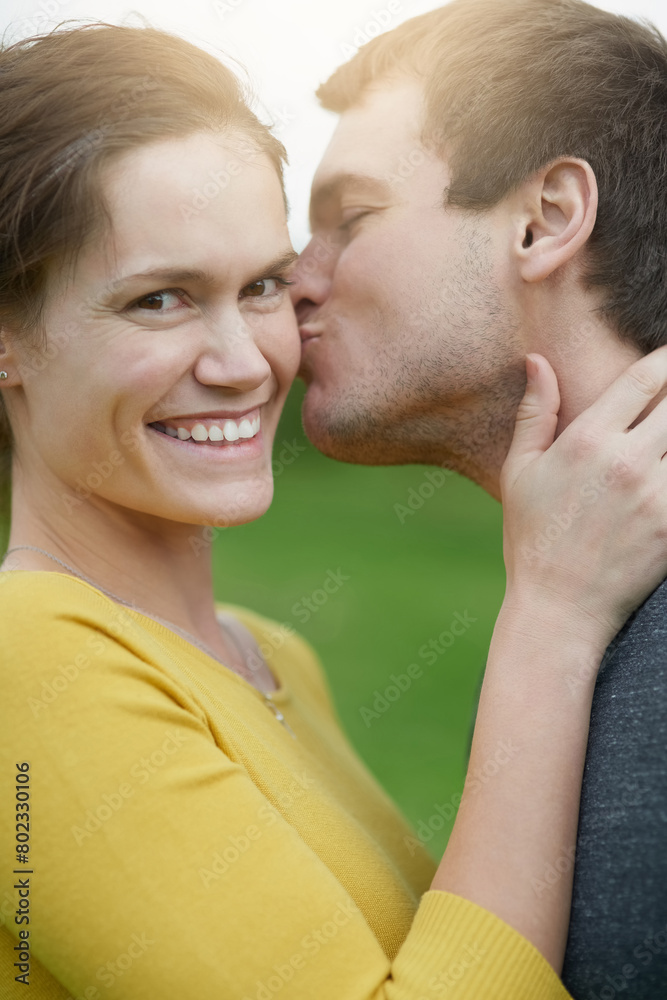 Love, kiss and portrait of couple in nature for outdoor countryside vacation, getaway or holiday together. Romance, smile and young man and woman on date for bonding on weekend trip in Australia.