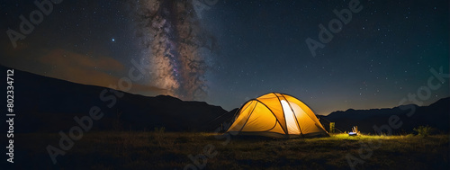 Cozy tent pitched in a remote camping spot, promising a night of stargazing and tranquility. © xKas