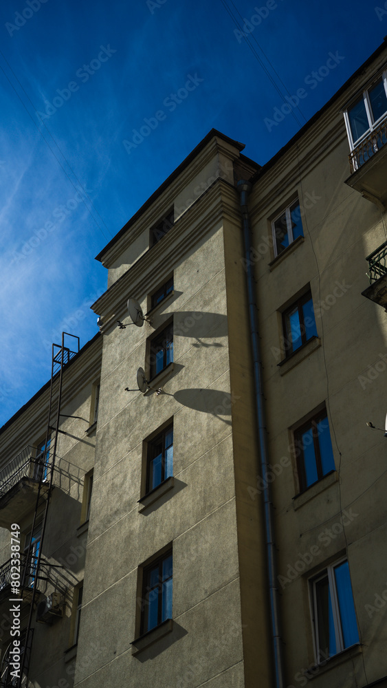 The facade of the building with a view of the sky The facade of the building with a view of the sky