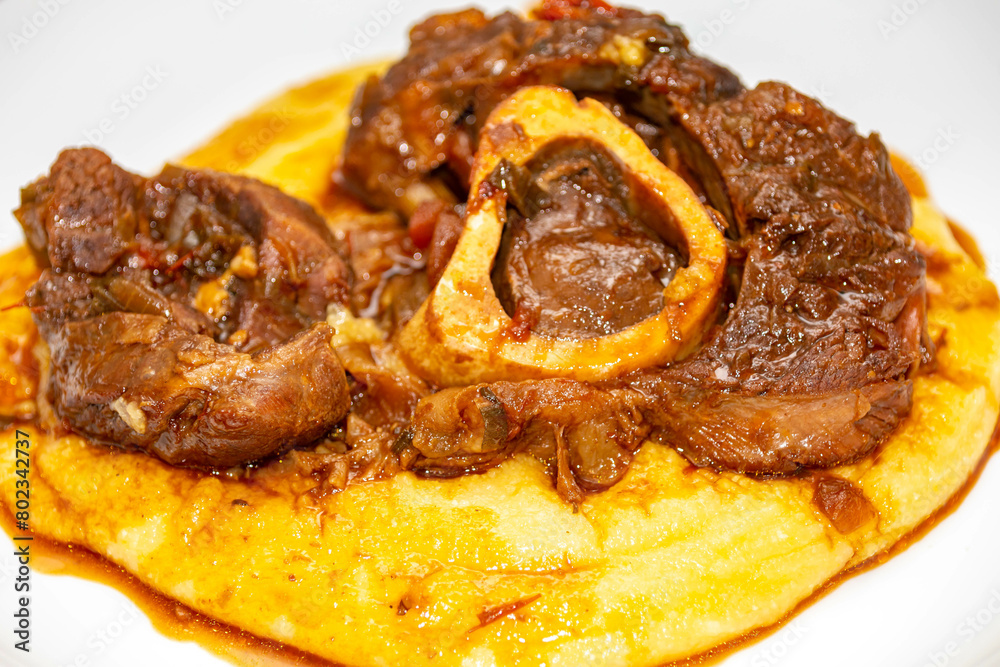 Traditional rustic recipe for ossobuco with polenta