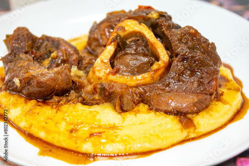 Traditional rustic recipe for ossobuco with polenta