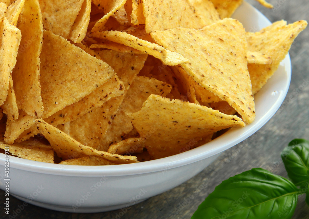 nacho corn chips and guacamole sauce