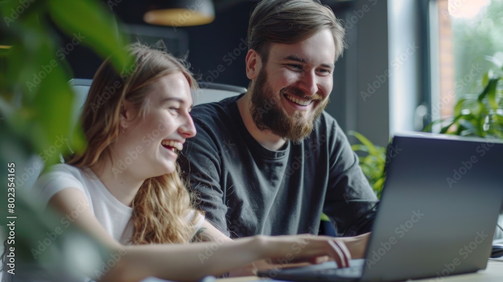 Colleagues Working on Laptop Together Colleagues Working on Laptop Together