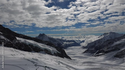 Swiss Alps - snow covered mountains at the start of the biggest glacier in Alps - Aletsch Glacier.