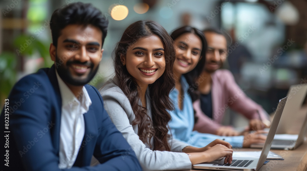 © PRASANNAPIX - young corporate employee team working together and giving happy expression at office © PRASANNAPIX - young corporate employee team working together and giving happy expression at office