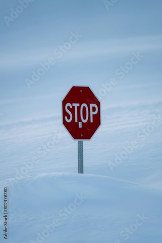 stop sign on the snow © Syed