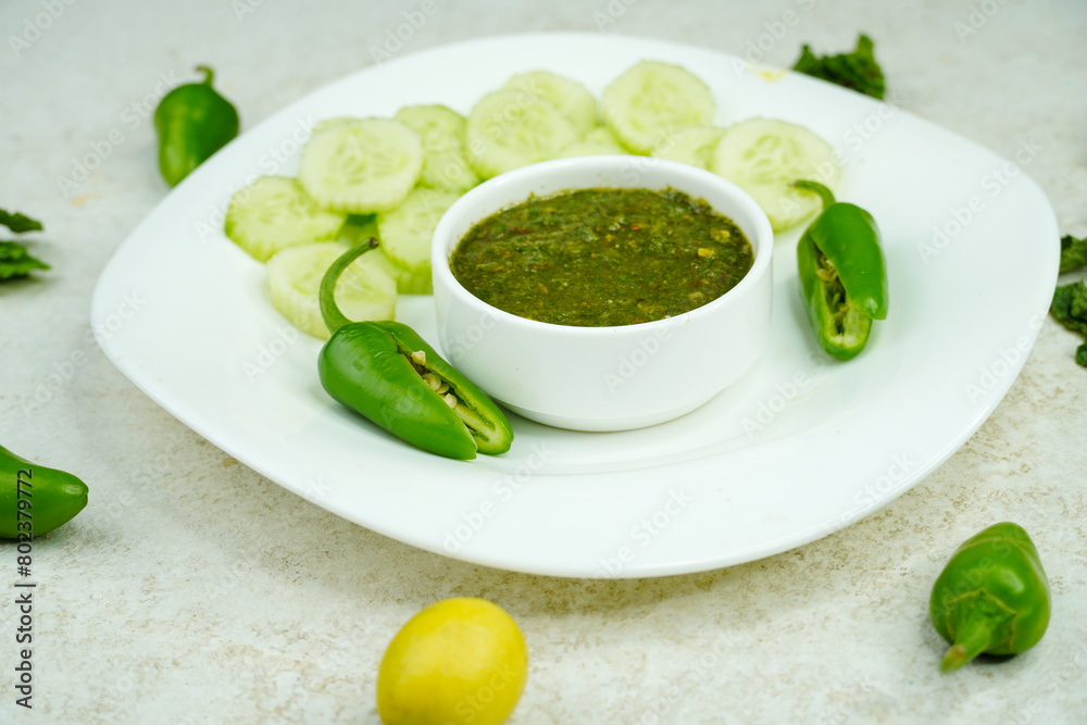 Mint and Green Chilli Sauce, Made with Tamarind Mint Coriander and Spices. Podina Chatni Mint and Green Chilli Sauce, Made with Tamarind Mint Coriander and Spices. Podina Chatni