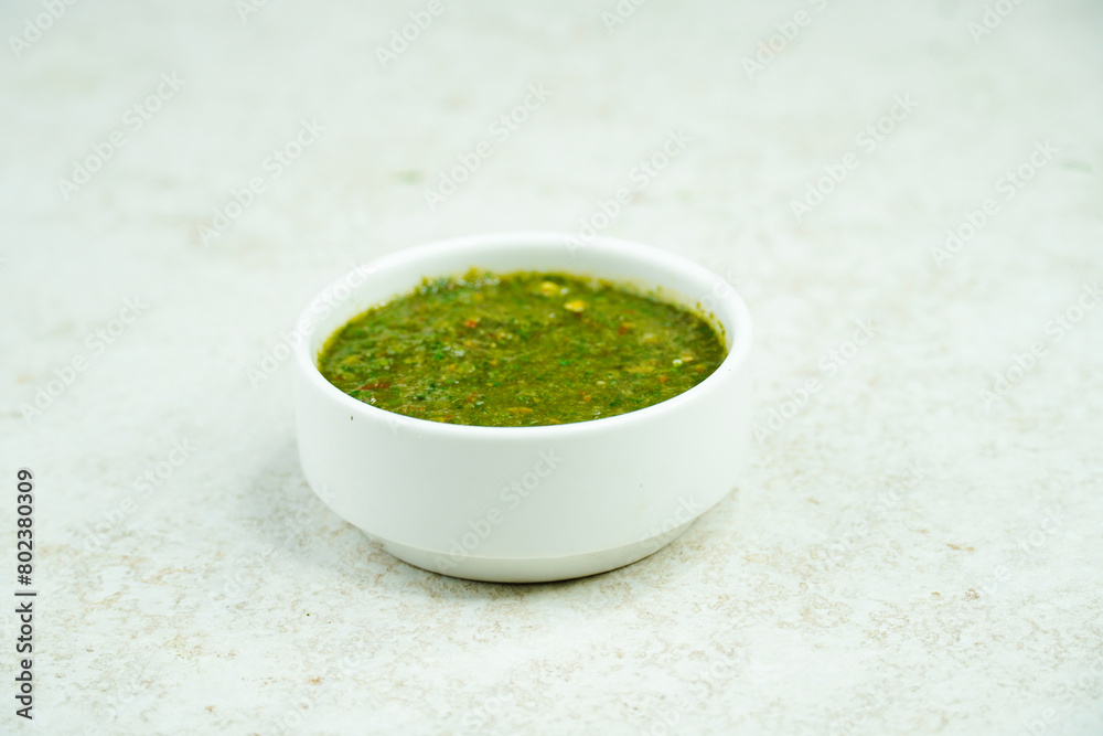 Mint and Green Chilli Sauce, Made with Tamarind Mint Coriander and Spices. Podina Chatni Mint and Green Chilli Sauce, Made with Tamarind Mint Coriander and Spices. Podina Chatni