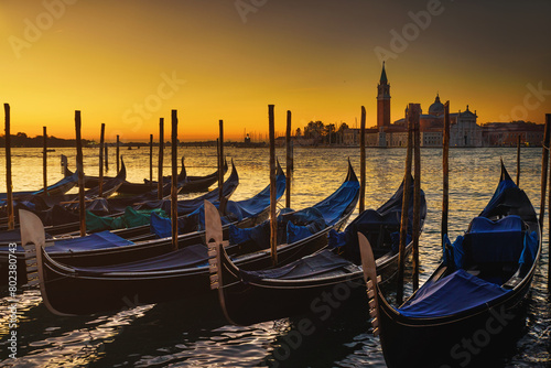 View of the gondolas of the Grand Canal bei sunrise in Venice, Italy. San Giorgio Maggiore. © Igor