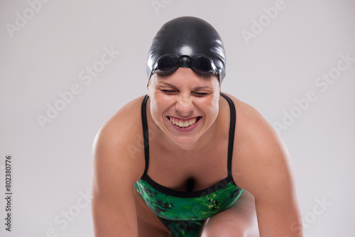 Woman swimmer laughs