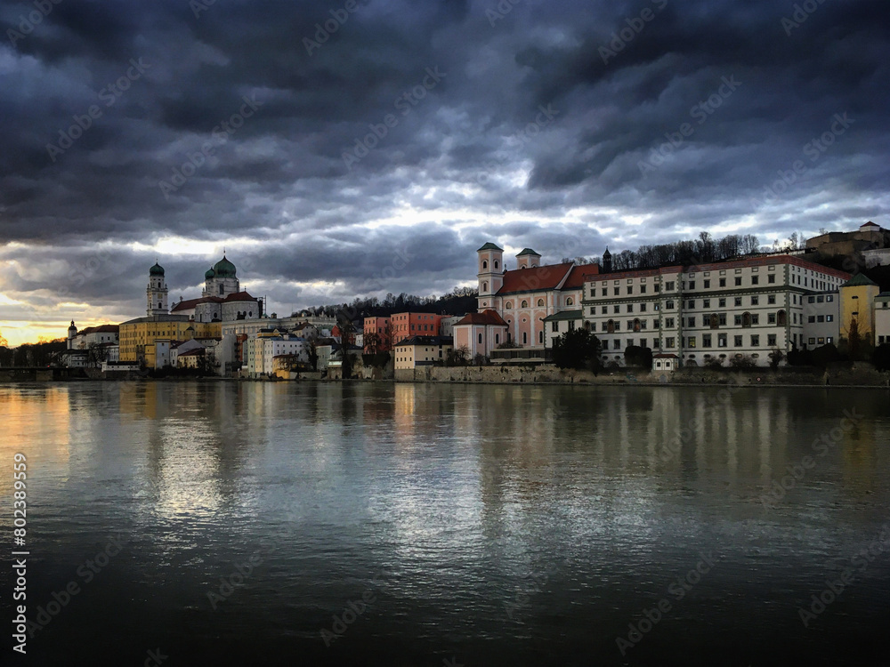 View of the town Passau over the river Inn during sunset, Bavaria, Germany, March 2019