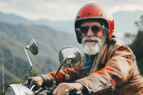A man with a white beard wearing a red helmet riding a motorcycle. Suitable for transportation and lifestyle concepts