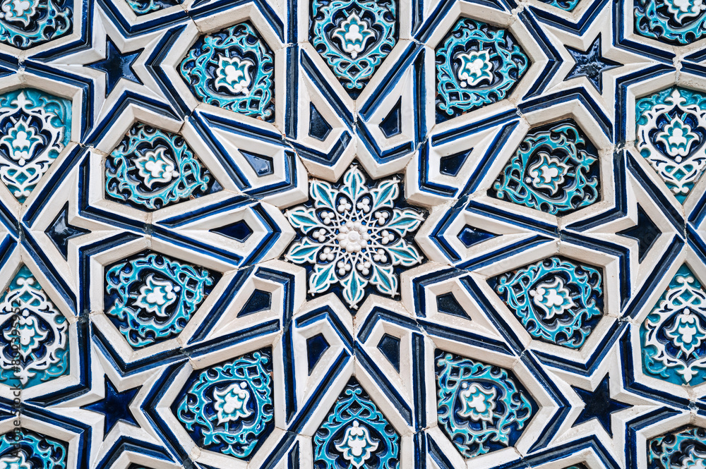 ceramic tile Uzbek mosaic with traditional oriental Arabic Islamic pattern decorated with blue and white starry floral ornament