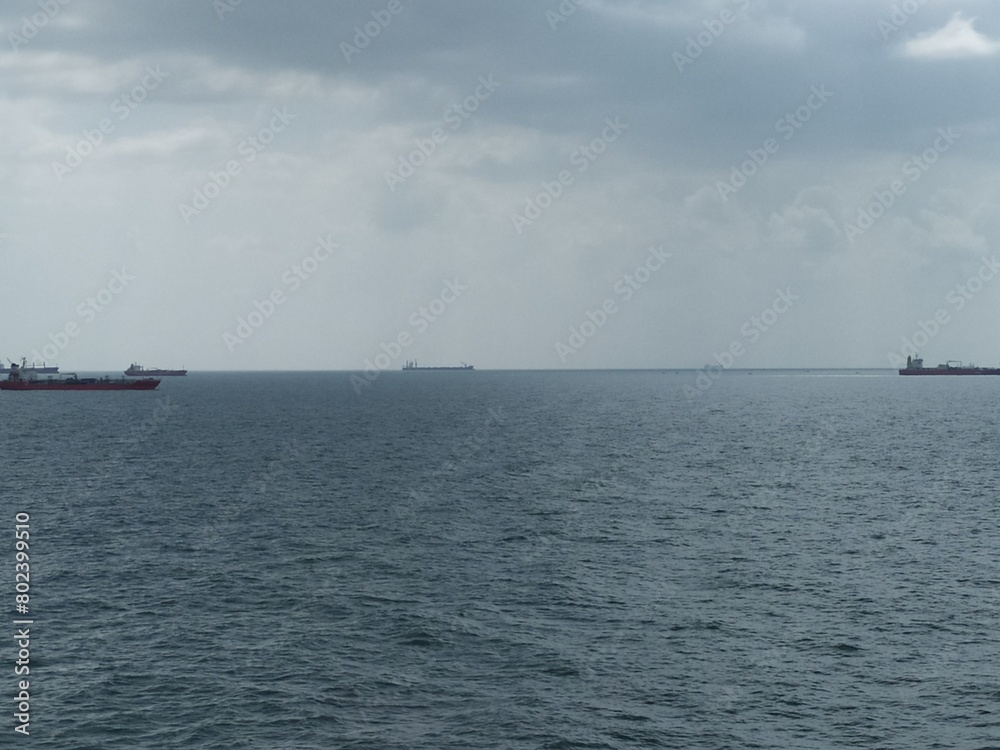 Sea with Cargo ships crossing