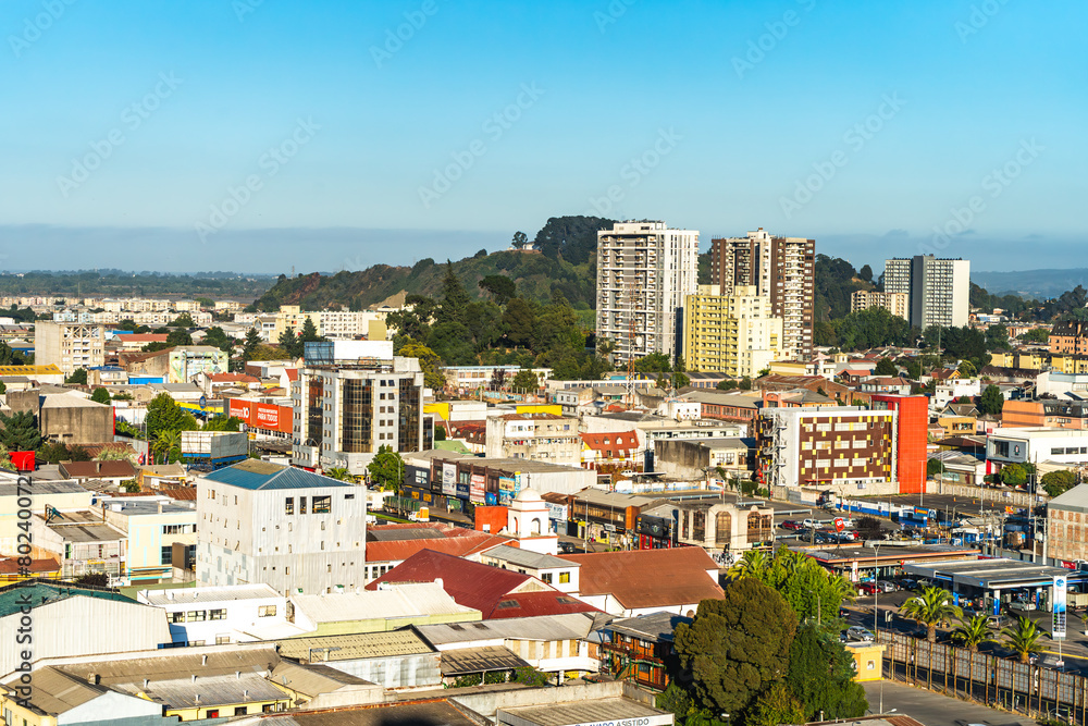 Downtown in Concepcion, Chile.
This is an aerial view of the center of the city in the morning with an open blue sky 