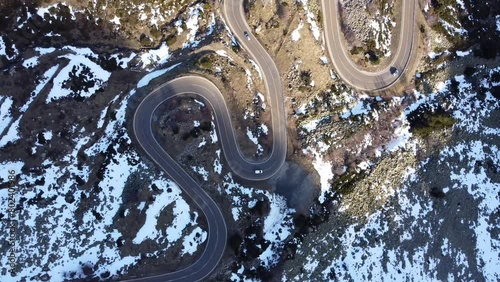 Video of an aerial view of the winding mountain road.
