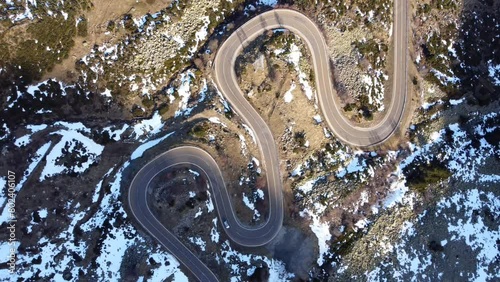 Video of an aerial view of the winding mountain road.
