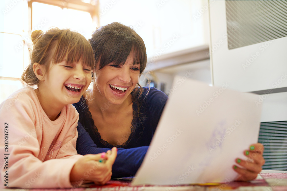 Happy mother, daughter and drawing with paper for fun coloring activity, bonding or homework. Mom and little girl, child or kid with smile for imagination, creativity or childhood together at house