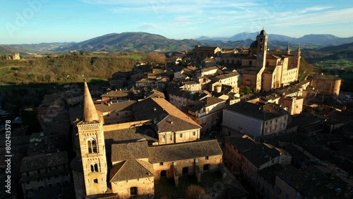 One of the most beautiful medieval towns of Italy - Urbino in Marche region. aerial drone panoramic high angle view over sunset. 4k hd video 