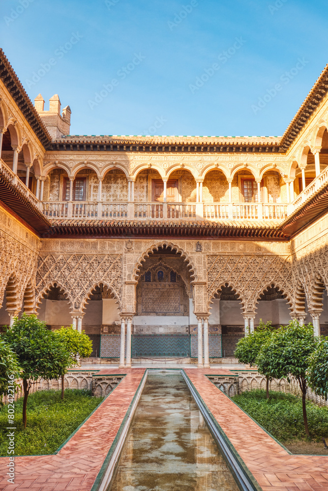 Fototapeta premium Courtyard in the Royal Alcazar of Seville (Real Alcazar de Sevilla), Seville