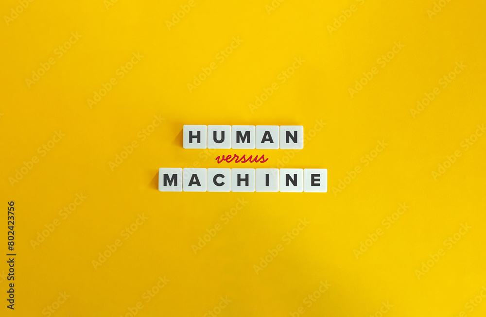 Human versus Machine. AI against Content Creator. Cursive Font and Text on Block Letter Tiles on Yellow Background. Minimalist Aesthetics. Human versus Machine. AI against Content Creator. Cursive Font and Text on Block Letter Tiles on Yellow Background. Minimalist Aesthetics.