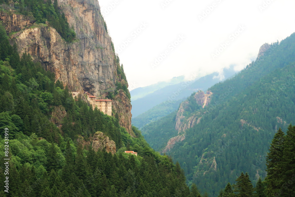 Spectacular view onto the Sumela, Sümela Monastery, built on a cliff above a dense forest next to a gorge, Trabzon, Turkey