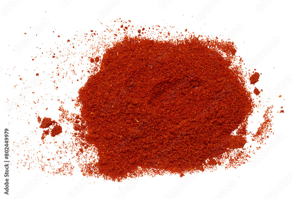 Scattered pile of smoked ground red paprika Scattered pile of smoked ground red paprika