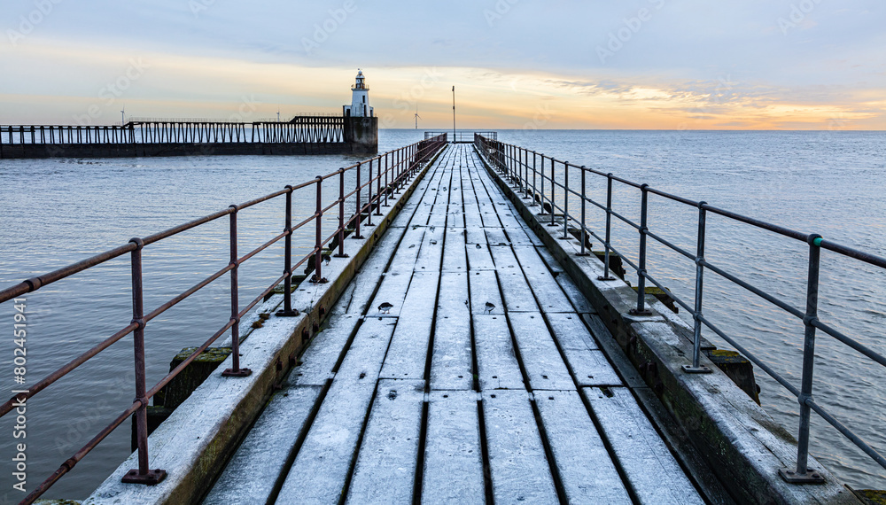 Winter sunrise, Blyth Piers. Blyth. Northumberland, UK.