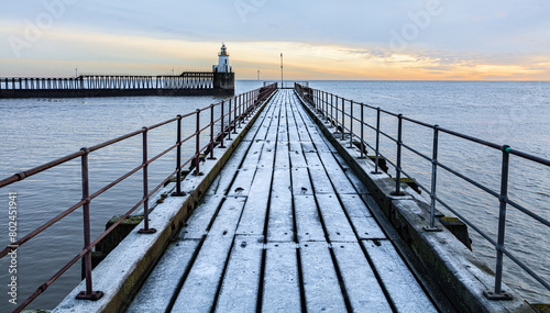 Winter sunrise  Blyth Piers. Blyth. Northumberland  UK.