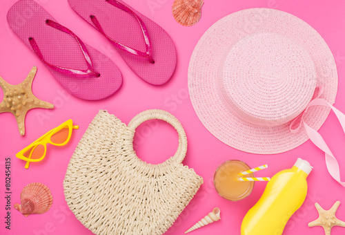 Flat lay with colorful beach accessories on color background. Vacation concept