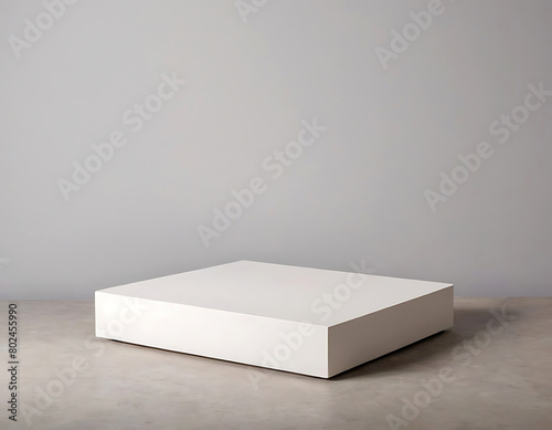 Background for product presentation - rectangular white podium on a grey background.