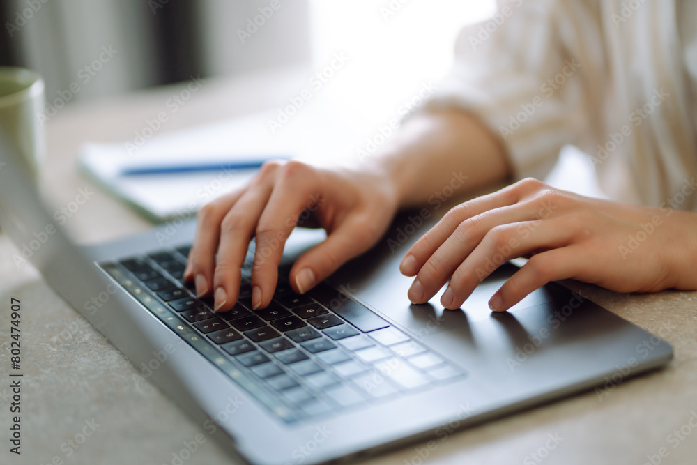 Close-up of a woman typing on a laptop keyboard. Business, Freelance, Shopping, education. Online. Close-up of a woman typing on a laptop keyboard. Business, Freelance, Shopping, education. Online.