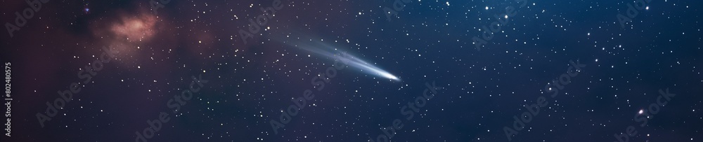 A comet in the starry sky. Comet flying in the universe with milky way galaxy on the background. Speeding comet with a long tale.
