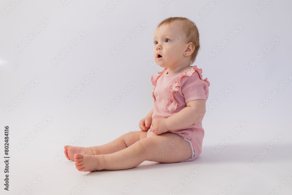 Cute baby girl in pink bodysuit on white background, space for text Cute baby girl in pink bodysuit on white background, space for text
