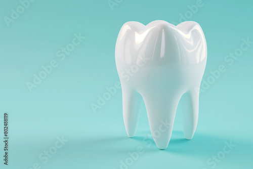 This image features a luminescent white tooth model on a serene blue backdrop  ideal for illustrating concepts related to dental health and the prevention of oral diseases.