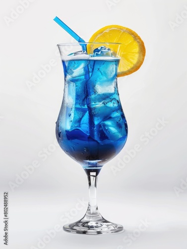 Blue Curacao Cocktail in Hurricane Glass - Isolated on White Background. Refreshing Long Drink