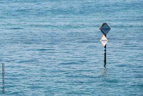 Two Shoal Signs in the Water Near the Old Seven Mile Bridge, Florida