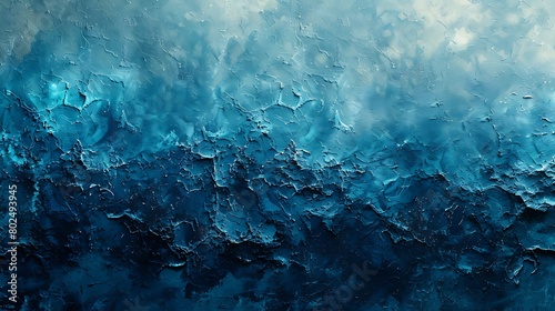 Abstract blue textured painting resembling stormy ocean waves under a tempestuous sky. photo