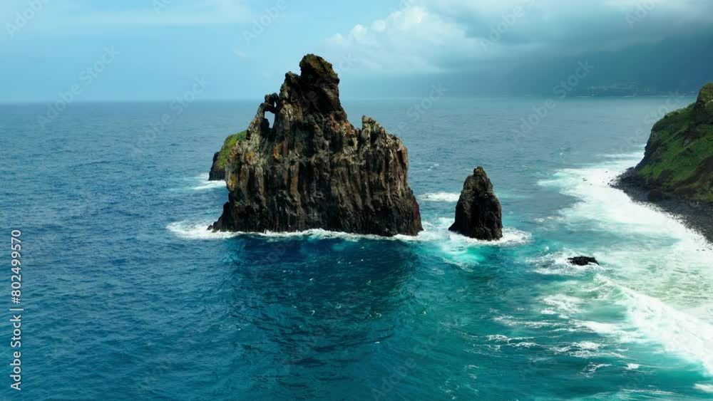 Aerial view of lava rocks in Atlantic ocean, islet towers in Ribeira da Janela on Madeira, Portugal Aerial view of lava rocks in Atlantic ocean, islet towers in Ribeira da Janela on Madeira, Portugal