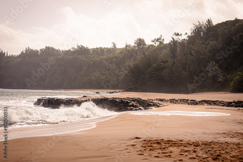 Kauapea (Secret ) Beach, Kauai, Hawaii. Secluded beach with a cliff accessible by a pretty steep trail photo
