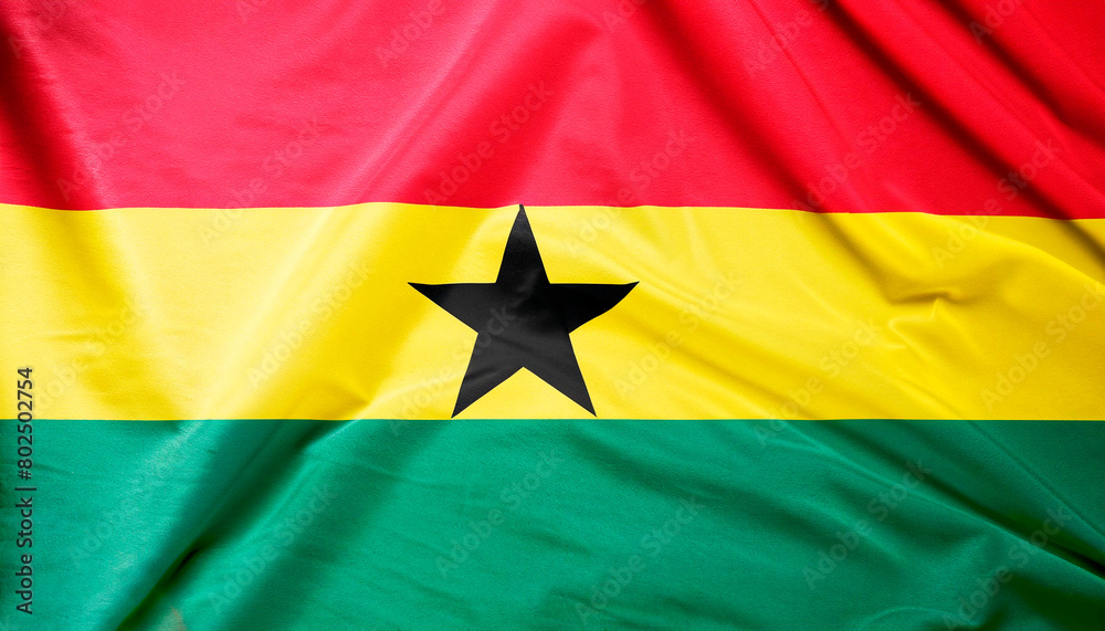 folded flag of Ghana with visible satin texture