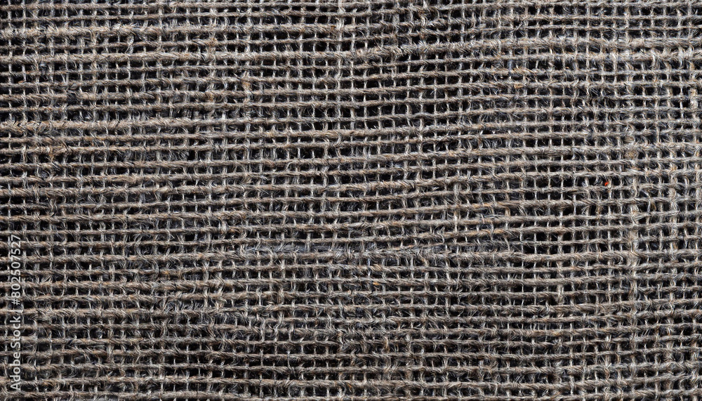 macro photo of old burlap black with canvas texture macro photo of old burlap black with canvas texture