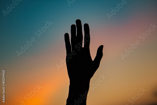 Hand Reaching Up Into the Sky